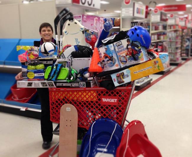 Holiday Wishes shopping cart overflowing with purchases