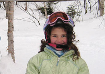 little girl skiing - donate